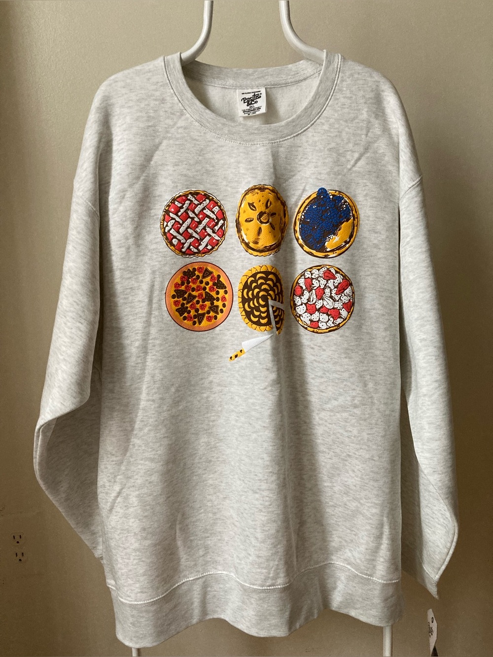 Pacifica Cream Crewneck Sweatshirt with Colorful Pie Graphic